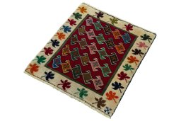 Corner detail of 2000s Persian Gabbeh rug showing border pattern and Wool pile