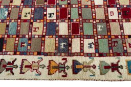 Close-up detail of 2000s Persian Gabbeh rug from Iran / Persia showing Wool weave