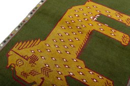 Backside of handmade 2000s Persian Gabbeh rug showing knot structure and weave density