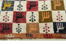 Central medallion detail of 2000s Persian Gabbeh rug from Iran / Persia