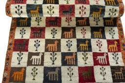 Full view of 2000s Persian Gabbeh rug from Iran / Persia, 155 × 76 cm in Multi Color tones