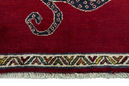 Central medallion detail of 2000s Persian Gabbeh rug from Iran / Persia