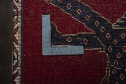 Full view of 2000s Persian Gabbeh rug from Iran / Persia, 104 × 67 cm in Red tones