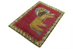 Corner detail of 2000s Persian Gabbeh rug showing border pattern and Wool pile