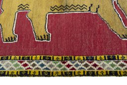 Close-up detail of 2000s Persian Gabbeh rug from Iran / Persia showing Wool weave