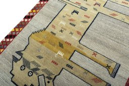 Backside of handmade 2000s Persian Gabbeh rug showing knot structure and weave density