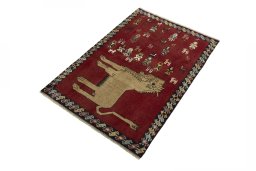 Corner detail of 2000s Persian Gabbeh rug showing border pattern and Wool pile