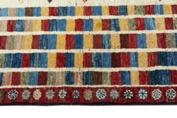 Close-up detail of 2000s Persian Gabbeh rug from Iran / Persia showing Wool weave