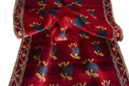 Corner detail of 2000s Persian Gabbeh rug showing border pattern and Wool pile