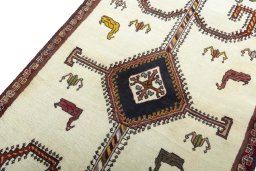 Backside of handmade 2000s Persian Gabbeh rug showing knot structure and weave density