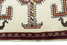 Close-up detail of 2000s Persian Gabbeh rug from Iran / Persia showing Wool weave
