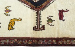Full view of 2000s Persian Gabbeh rug from Iran / Persia, 178 × 103 cm in Beige tones