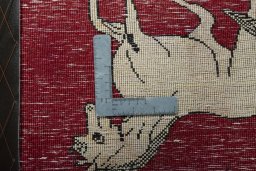 Backside of handmade 2000s Persian Gabbeh rug showing knot structure and weave density