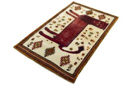 Corner detail of 1970s Persian Gabbeh rug showing border pattern and Wool pile