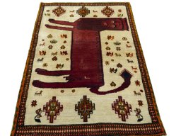 Surface texture of 1970s Persian Gabbeh rug with natural Wool and intricate pattern