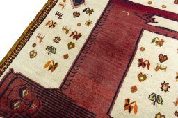 Backside of handmade 1970s Persian Gabbeh rug showing knot structure and weave density