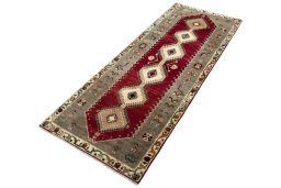 Corner detail of 2000s Persian Gabbeh rug showing border pattern and Wool pile