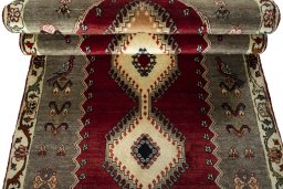 Full view of 2000s Persian Gabbeh rug from Iran / Persia, 290 × 105 cm in Red tones