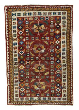 Full view of 2000s Persian Gabbeh rug from Iran / Persia, 190 × 130 cm in Red tones