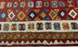 Close-up detail of 2000s Persian Gabbeh rug from Iran / Persia showing Wool weave