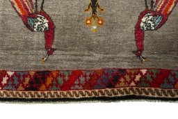 Central medallion detail of 2000s Persian Gabbeh rug from Iran / Persia