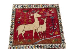 Surface texture of 1970s Persian Gabbeh rug with natural Wool and intricate pattern