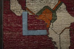Backside of handmade 1970s Persian Gabbeh rug showing knot structure and weave density