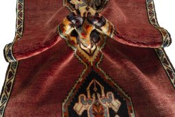 Corner detail of 2000s Persian Gabbeh rug showing border pattern and Wool pile