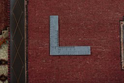 Close-up detail of 2000s Persian Gabbeh rug from Iran / Persia showing Wool weave