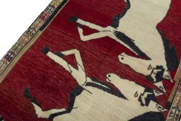 Backside of handmade 2000s Persian Gabbeh rug showing knot structure and weave density