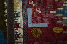 Close-up detail of 2000s Persian Gabbeh rug from Iran / Persia showing Wool weave