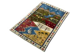 Corner detail of 2000s Persian Gabbeh rug showing border pattern and Wool pile