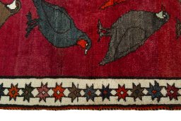 Close-up detail of 2000s Persian Gabbeh rug from Iran / Persia showing Wool weave