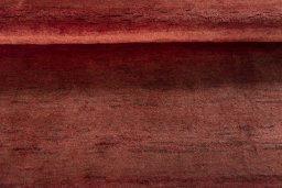 Full view of 2000s Persian Gabbeh rug from Iran / Persia, 197 × 151 cm in Red tones