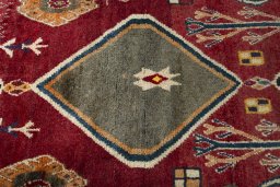 Central medallion detail of 2000s Persian Gabbeh rug from Iran / Persia