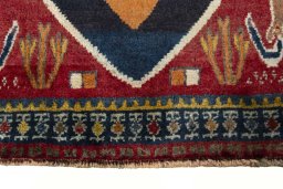 Close-up detail of 2000s Persian Gabbeh rug from Iran / Persia showing Wool weave