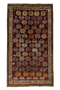 Full view of 2000s Persian Gabbeh rug from Iran / Persia, 286 × 162 cm in Red tones