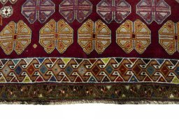 Central medallion detail of 2000s Persian Gabbeh rug from Iran / Persia