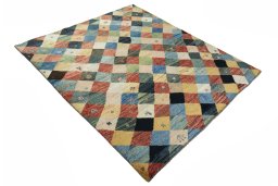 Close-up detail of 2000s Persian Gabbeh rug from Iran / Persia showing Wool weave