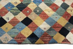 Central medallion detail of 2000s Persian Gabbeh rug from Iran / Persia