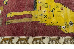Close-up detail of 2000s Persian Gabbeh rug from Iran / Persia showing Wool weave