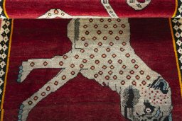 Full view of 2000s Persian Gabbeh rug from Iran / Persia, 146 × 104 cm in Red tones