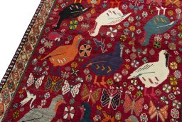 Backside of handmade 2000s Persian Gabbeh rug showing knot structure and weave density