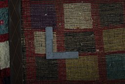 Close-up detail of 2000s Persian Gabbeh rug from Iran / Persia showing Wool weave