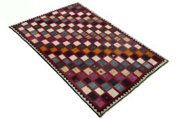 Close-up detail of 2000s Persian Gabbeh rug from Iran / Persia showing Wool weave
