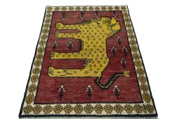 Surface texture of 2000s Persian Gabbeh rug with natural Wool and intricate pattern