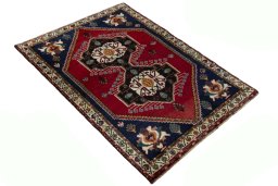Close-up detail of 2000s Persian Gabbeh rug from Iran / Persia showing Wool weave