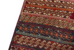 Backside of handmade 2000s Persian Gabbeh rug showing knot structure and weave density