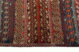 Close-up detail of 2000s Persian Gabbeh rug from Iran / Persia showing Wool weave