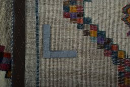 Close-up detail of 2000s Persian Gabbeh rug from Iran / Persia showing Wool weave